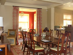 Ceiling, woodwork and walls painted in muted historical colors helps to tie together three rooms (R30)