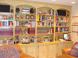 Wood grain faux finish on wall units (R6).