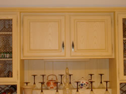 Wood grain faux finish on cabinets (S79).